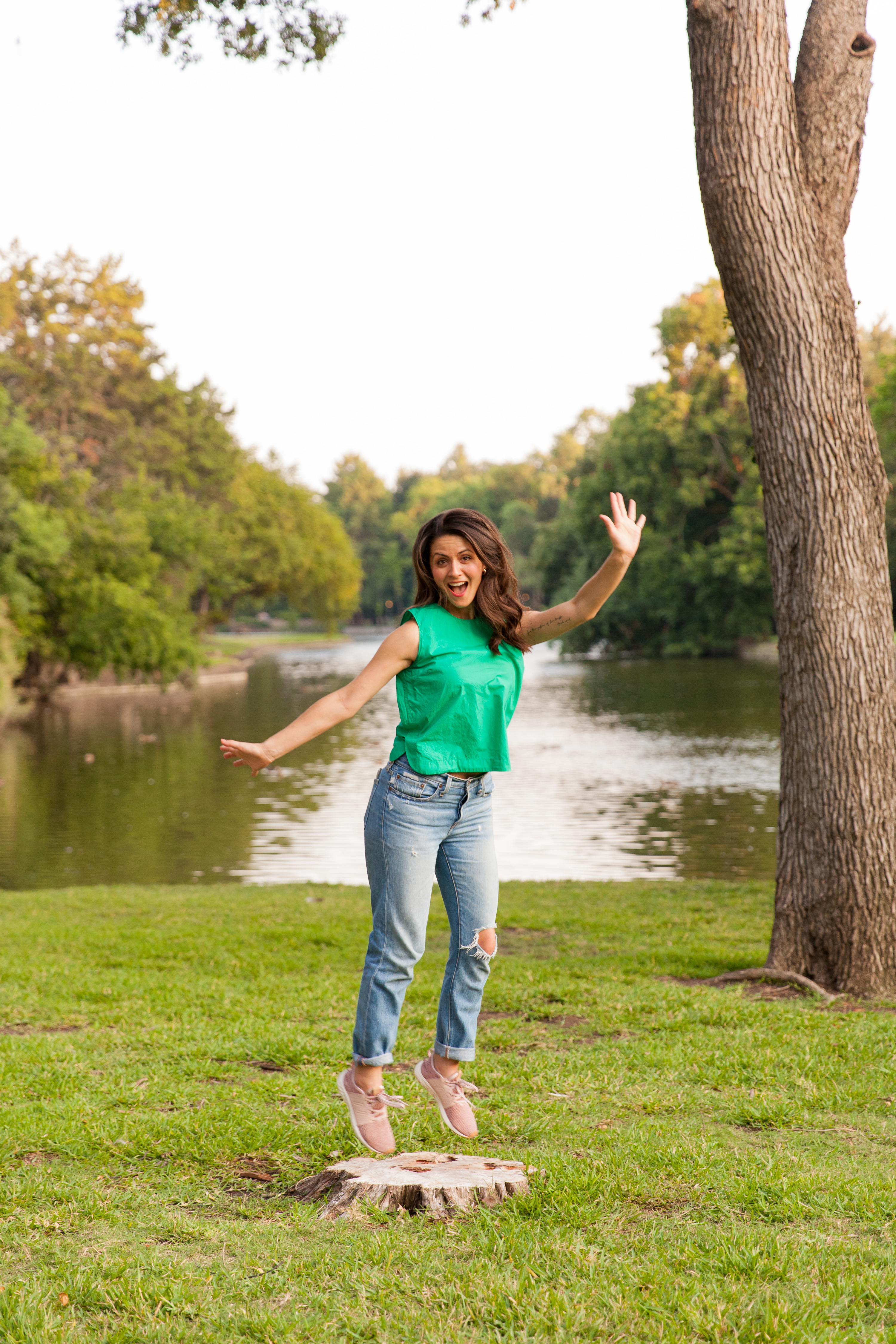 Portrait of a girl jumping at Lakeside Park in Dallas Texas by Alyssa Grace Photography